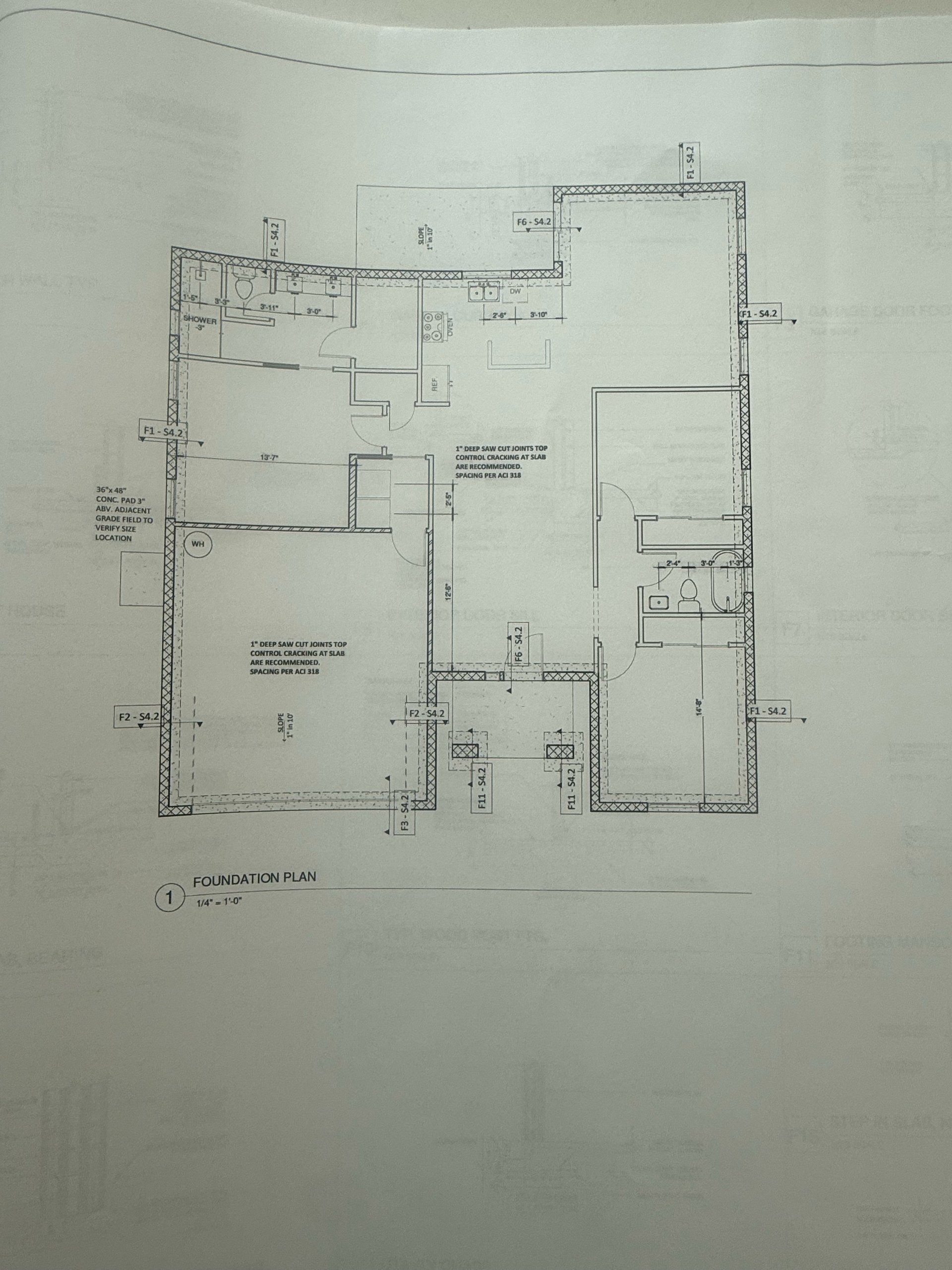 Architectural foundation plan blueprint showing building layout with dimensions, walls, and structural measurements